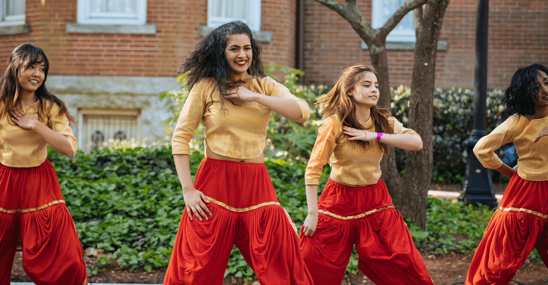 female students dancing